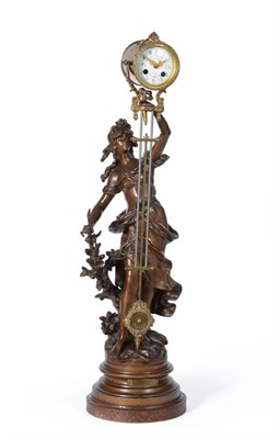 Lot 889 - A Bronzed Spelter Swinging Mystery Striking Mantel Clock, retailed by Lesieur, circa 1900, case...