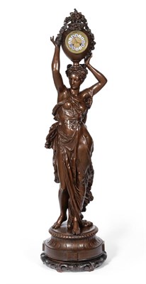 Lot 905 - A Large Bronzed Figural Striking Floor Standing Clock, circa 1890, maiden in robes holding a...