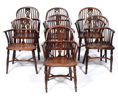 Lot 963 - A Harlequin Set of Seven 19th Century Yew and Elm-Seated Windsor Armchairs, comprising six with...