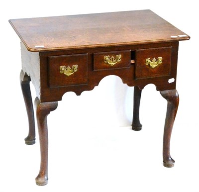 Lot 968 - A George III Joined Oak Lowboy or Dressing Table, late 18th century, the moulded top above...