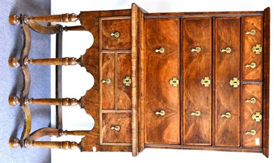 Lot 969 - A George II Walnut and Feather Banded Chest on Stand, the moulded top above two and three long...