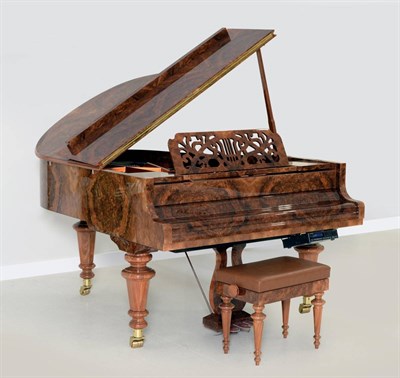 Lot 976 - A Bosendorfer Burr Walnut 5'7 " Johann Strauss Model Grand Piano, of recent date, retailed by...