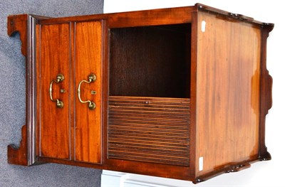 Lot 978 - A George III Mahogany Tray Top Commode, circa 1800, the gallery top with two carrying handles above