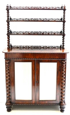 Lot 981 - A William IV Rosewood Cabinet, 2nd quarter 19th century, with three shelves and fret cut...