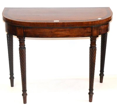 Lot 1004 - An Early 19th Century Mahogany and Rosewood Crossbanded Card Table, of D shaped form, with...