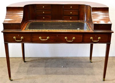 Lot 1009 - A Victorian Mahogany Carlton House Desk, late 19th century, the superstructure with an...