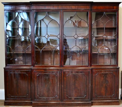 Lot 1020 - A Late George III Mahogany Library Four Door Breakfront Bookcase, early 19th century, the upper...