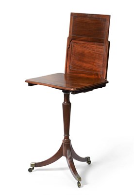 Lot 1022 - An Unusual George III Mahogany Tripod Table, early 19th century, the rounded top with sliding...