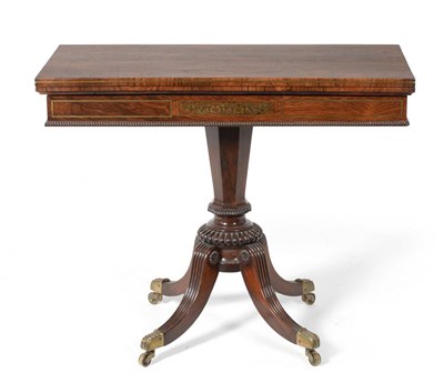 Lot 1026 - A Fine Regency Rosewood and Brass Inlaid Card Table, early 19th century, the hinged leaf...