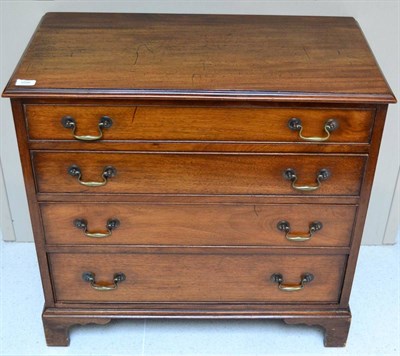 Lot 1036 - A George III Style Mahogany Straight Front Chest of Drawers, the moulded top above four long...