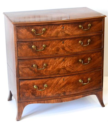 Lot 1037 - A George III Mahogany Bowfront Chest of Drawers, circa 1800, the moulded top above four long...