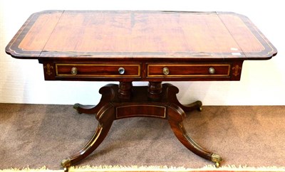 Lot 1039 - A Regency Rosewood, Crossbanded and Brass Inlaid Sofa Table, early 19th century, with two...