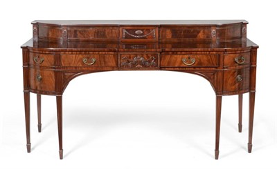 Lot 1043 - A Late George III Scottish Mahogany Breakfront Sideboard, early 19th century, the...