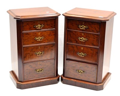 Lot 1044 - A Pair of Mahogany Four Drawer Bedside Chests, the moulded tops above long graduated drawers...