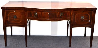 Lot 1047 - A George III Mahogany, Tulipwood Crossbanded and Boxwood Strung Serpentine Shaped Sideboard,...