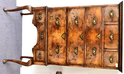 Lot 1050 - A George II Style Walnut Chest on Stand, the cavetto cornice above three small and three long...