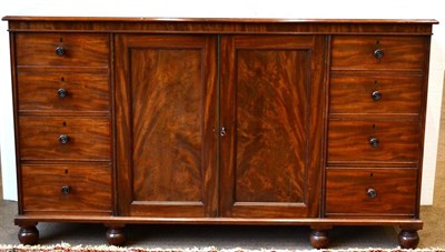 Lot 1053 - A Mahogany Dwarf Linen Press, 2nd quarter 19th century, the moulded top above two cupboard...