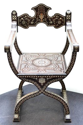 Lot 1069 - A Late 19th Century Italian Savonarola Walnut Armchair, inlaid with geometric ivory and...