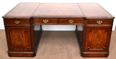 Lot 1086 - A George III Chippendale Revival Mahogany Partners' Desk, 20th century, of inverted breakfront form