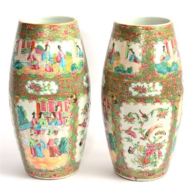 Lot 48 - A Pair of Cantonese Famille Rose Vases, mid 19th century, each of barrel form, decorated in typical