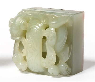 Lot 59 - A Chinese Celadon Jade Seal, probably Qianlong, of square form carved with four characters to...
