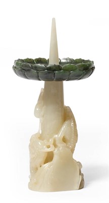 Lot 60 - A Two-Piece Mutton Fat Jade and Spinach Green Jade Pricket Candlestick, Qing Dynasty, the pale even