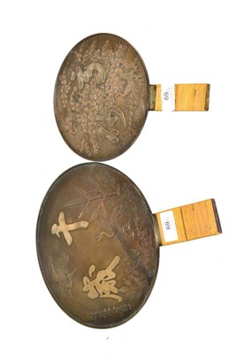 Lot 69 - A Japanese Bronze Hand Mirror, polished and silvered to one side, the reverse cast with cranes,...