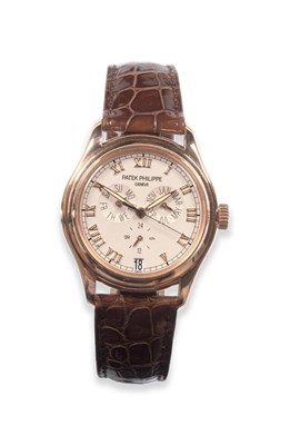 Lot 109 - A Fine 18ct Rose Gold Automatic Annual Calendar Centre Seconds Wristwatch with 24-hour...