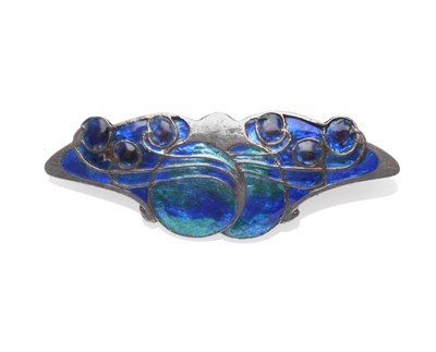 Lot 230 - An Arts & Crafts Enamelled Brooch, in the style of Archibald Knox, enamelled in blues and...