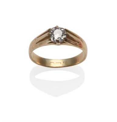 Lot 240 - A Diamond Solitaire Ring, the old cut diamond in a yellow claw setting to forked shoulders on a...