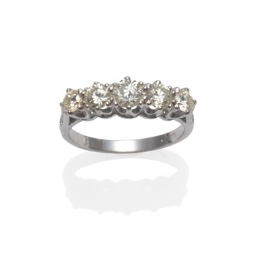 Lot 256 - A Diamond Five Stone Ring, the graduated round brilliant cut diamonds in white claw settings,...