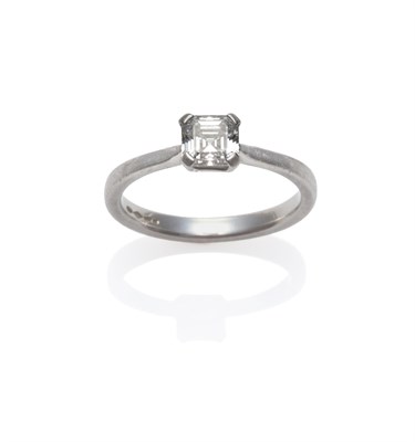 Lot 286 - A Platinum Diamond Solitaire Ring, the Asscher cut diamond in a four claw setting, to a tapered...