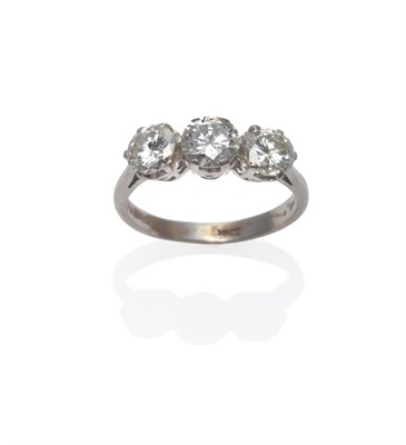 Lot 287 - A Diamond Three Stone Ring, round brilliant cut diamonds in white claw settings, to a tapered...