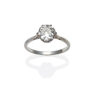 Lot 291 - A Diamond Solitaire Ring, the old cut diamond in a white six claw setting, to a tapered...