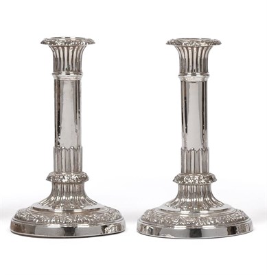 Lot 382 - A Pair of George III Silver Candlesticks John & Thomas Settle, Sheffield 1816, the circular...