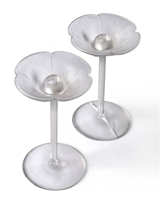 Lot 429 - A Pair of René Lalique Pavot Clear and Frosted Glass Candlesticks, the Papaver shaped sconce...