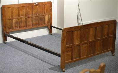 Lot 559 - A Sid Pollard of Thirsk 4ft Oak Panelled Bedstead, with vono metal side rails, unmarked, 137cm...