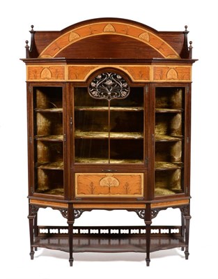 Lot 579 - An Art Nouveau Inlaid Mahogany Glazed Display Cabinet, with raised upstand, above an inlaid...