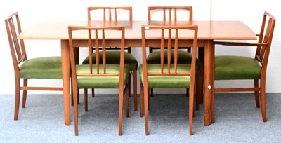 Lot 601 - A 1960's Gordon Russell Teak Dining Room Suite, comprising extending table, the shaped...