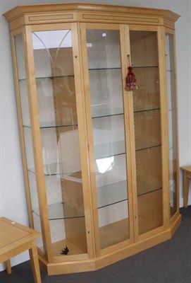 Lot 3001 - A Beech Display Cabinet, modern, of canted form with etched glazed doors enclosing five...