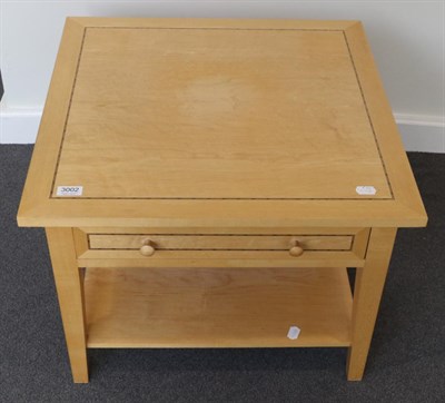 Lot 3002 - A Beech Coffee Table, modern, with burr wood top and strung border above a single drawer, raised on