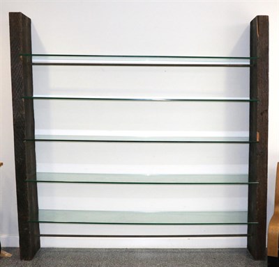 Lot 3011 - A Free-Standing Bookcase, of recent date, in the form of two railway sleepers, with five...