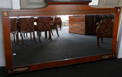 Lot 3024 - An Egyptian Revival Burr Maple, Ebony and Gilt Metal Mounted Overmantel, modern, with staged...