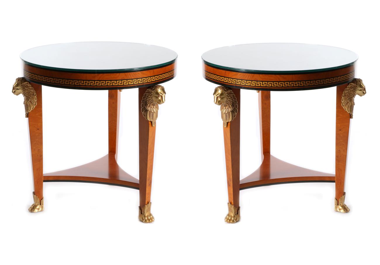 Lot 3025 - A Pair of Egyptian Revival Burr Maple, Ebony and Gilt Metal Mounted Circular Tables, modern,...