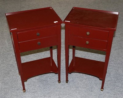 Lot 3032 - A Pair of Roche Bobois Red Painted Two-Drawer Bedside Tables, modern, with galleried tops above two