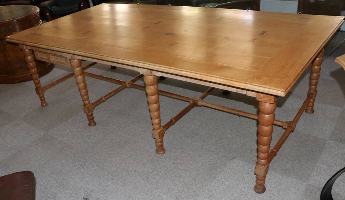 Lot 3048 - A Bespoke Oak Dining Table, modern, of plank construction with cleated ends, the underside...