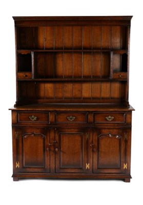 Lot 3049 - A Titchmarsh & Goodwin Oak Enclosed Dresser and Rack, modern, with two shelves and open niches with
