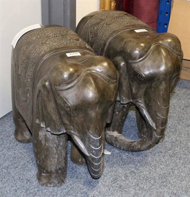 Lot 3056 - A Pair of Indian Carved Stone Figures of Elephants, modern, standing on four square from legs...