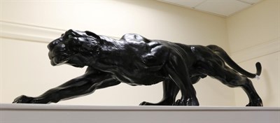 Lot 3071 - A Large Model of a Stalking Panther, black painted plaster, 190cm long  Provenance: By repute...