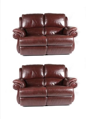 Lot 3126 - A Pair of Burgundy Leather La-Z-Boy Electric Reclining Two-Seater Sofas, modern, 155cm by 88cm...